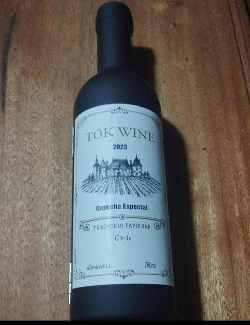 Lote anterior: Juego de sacacorchos y botellas de vino