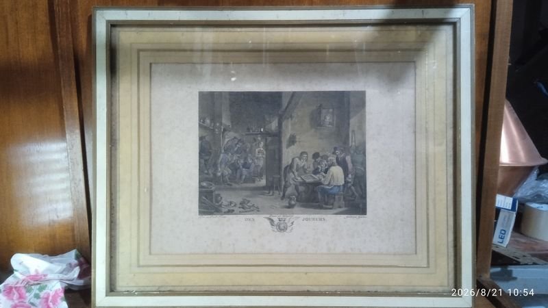 grabado enmarcado parece ser una reproducción de una escena de taberna flamenca atribuida o realizada After David Teniers the Younger