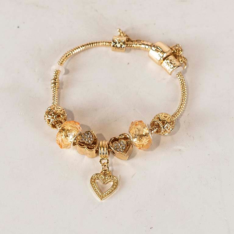 Lote anterior: Pulsera de fantasía con corazones y amatistas
