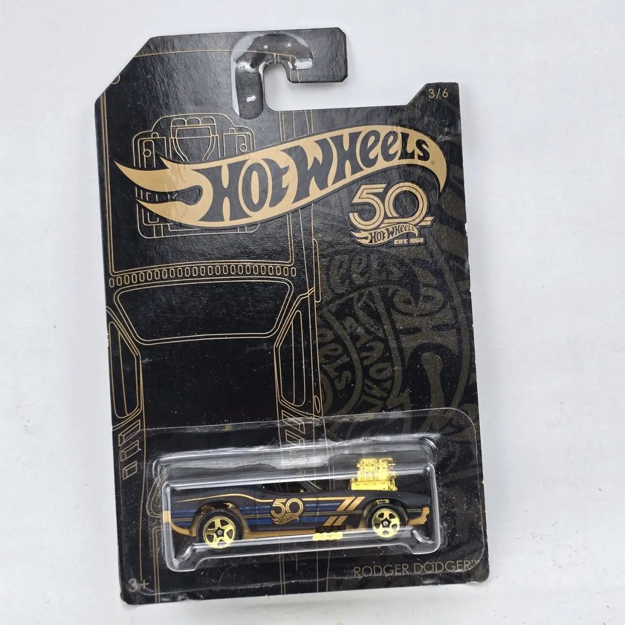 Hot Wheels 50 Aniversario Rodger Dodger Negro y Dorado