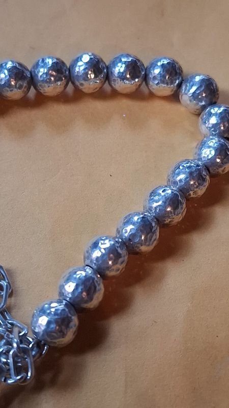 Pulsera de plata con detalles artesanales - imagen 5