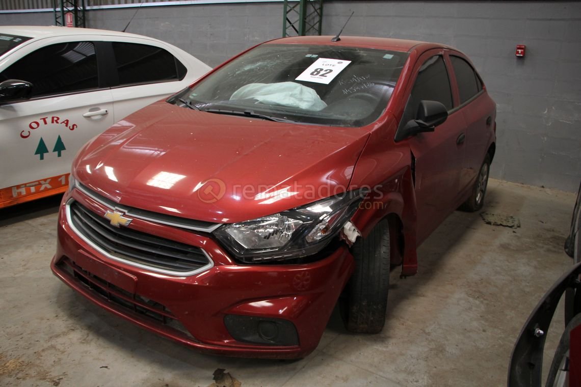Chevrolet Onix Joy Rojo con Daños