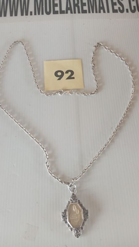 Colgante de plata con imagen de la Virgen del Huerto