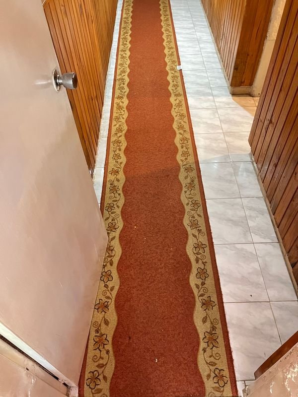 Alfombra larga de diseño floral