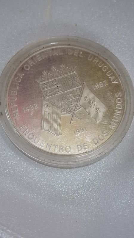 Moneda de Plata Encapsulada "Encuentro de Dos Mundos" Uruguay 1492-1991