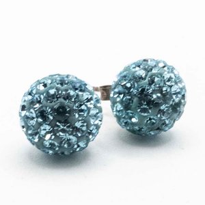 Lote siguiente: Par de Tornillos de Plata con Piedras Celestes