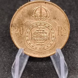 Lote siguiente: Moneda Antigua de Bronce con Retrato y Corona
