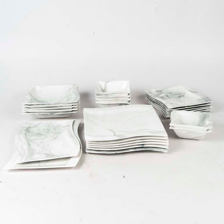 25 Piezas porcelana española Malacasa. Diseño tipo mármol gris y blanco. Medidas: 26x26 cm