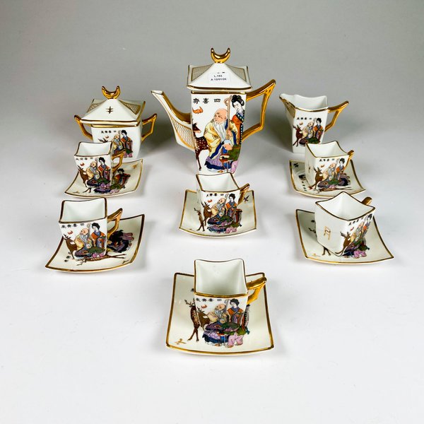 Juego de porcelana oriental para café, quince piezas decoradas personajes - imagen 1