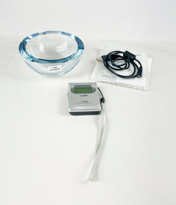 Lote anterior: Vendedor de Mp3 y cenicero en cristal
