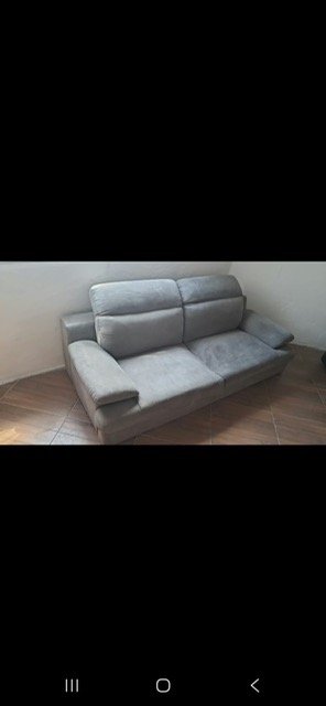 Sillón de 2 cuerpos gris con apoya cabeza reclinable
