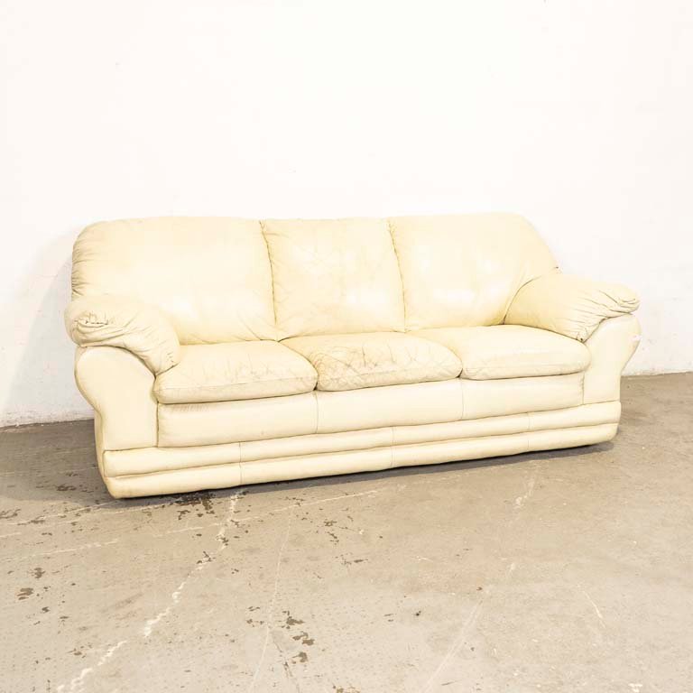 Lote anterior: Sofá de tres cuerpos tapizado en cuero beige para venta