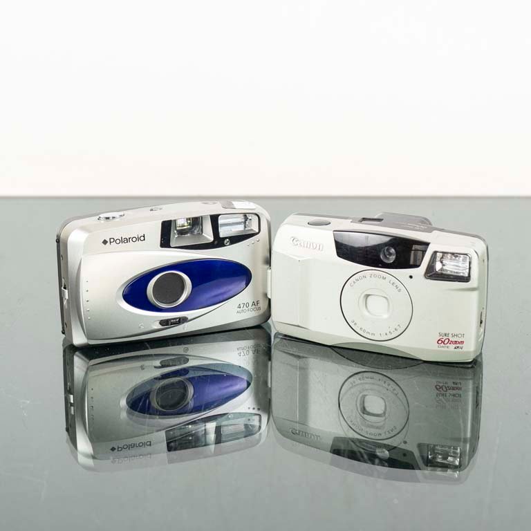 Lote siguiente: Cámaras Analógicas Canon y Polaroid en Venta