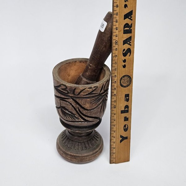 Mortero de madera con pilón