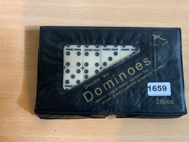 Lote anterior: Juego de Dominó en su estuche original