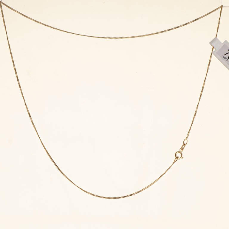Lote siguiente: Cadena de Oro 18k con Claspe y Anillo