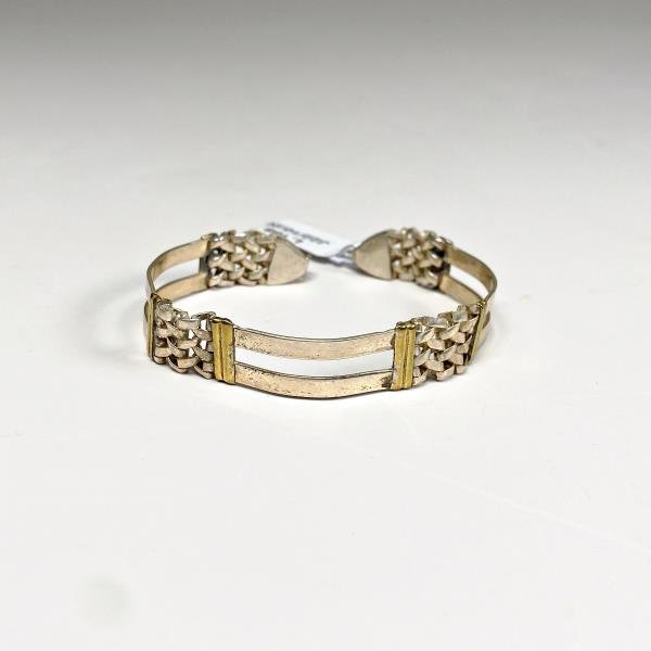 Pulsera Ancha de Plata con Detalles Dorados