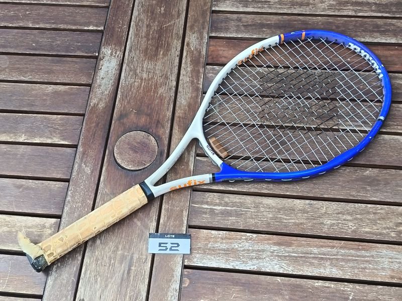 Raquetas de tenis Sutix Carbon con encordado con detalles de uso