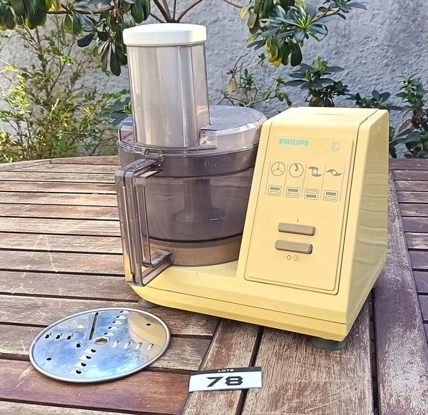 Procesadora de alimentos Philips con recipiente, tapas y discos accesorios para corte o rallado - Funciona