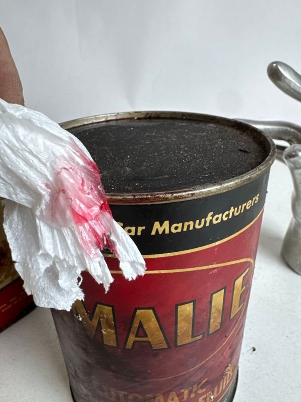 Antiguas latas de aceite con su contenido - imagen 11