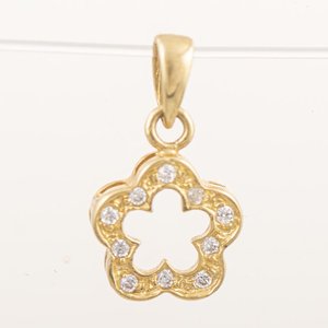 Lote siguiente: Dije de Oro 18k con Circonias en Forma de Flor