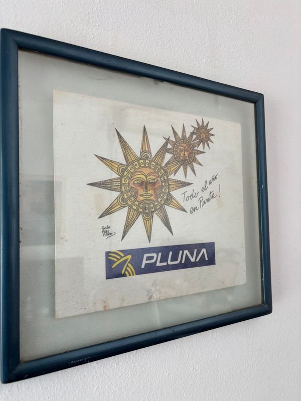 Antiguo afiche Pluna con firma de Carlos Páez Vilaró