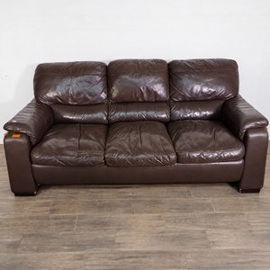 Lote siguiente: Sillón de 3 cuerpos de cuero marrón oscuro