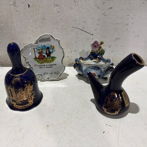 Lote anterior: Adornos de Oro y Plata de Ley: Campana y Pipa Decorativa