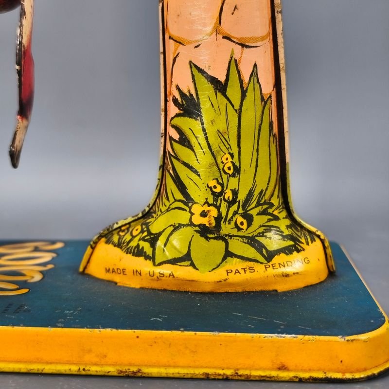 Juguetes antiguos de metal y madera, con detalles de palmeras y aves - imagen 3