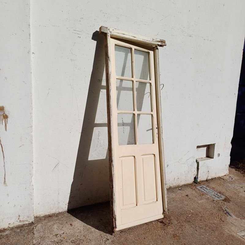 Puerta de tablero en cedro con vidrios estilo colonial y marco de pinotea - imagen 3
