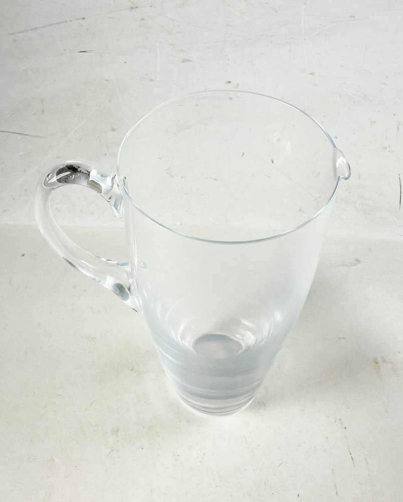 Jarra de vidrio transparente con asa y tapa - imagen 3