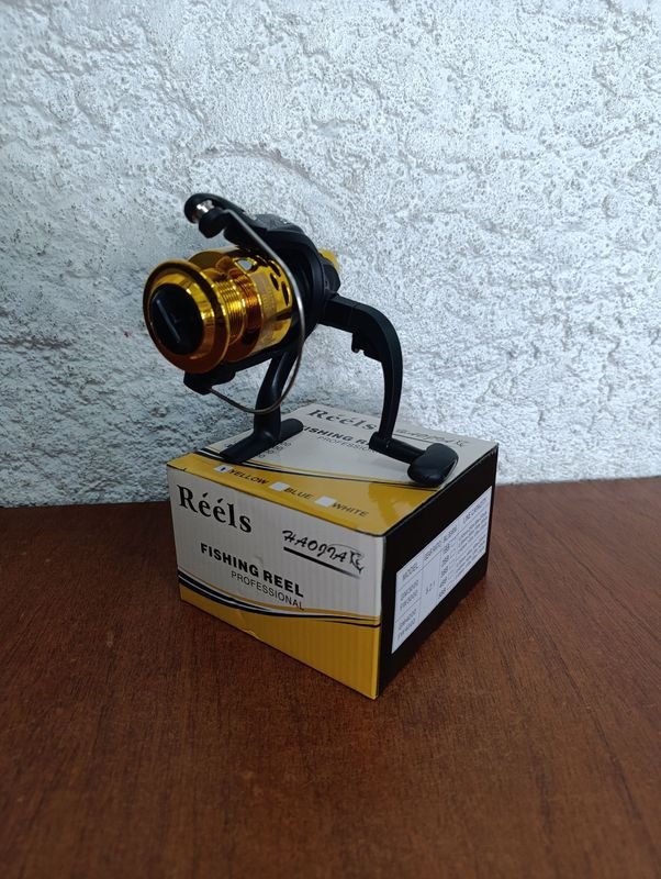 Lote siguiente: Reel Frontal Amarillo - Equipo de Pesca