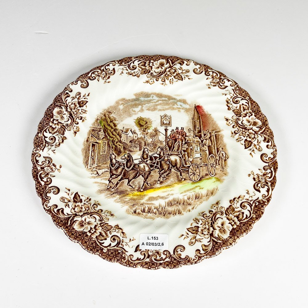 Lote siguiente: Plato de loza inglesa decorado con escenas de carruajes