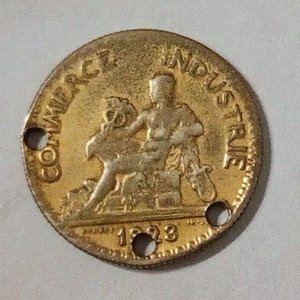 Lote siguiente: Moneda Francesa 50 Centimes Cámara de Comercio 1923 con Perforaciones