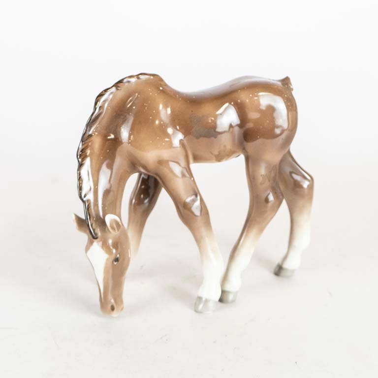 Lote siguiente: Figura de Caballo de Porcelana con Avería