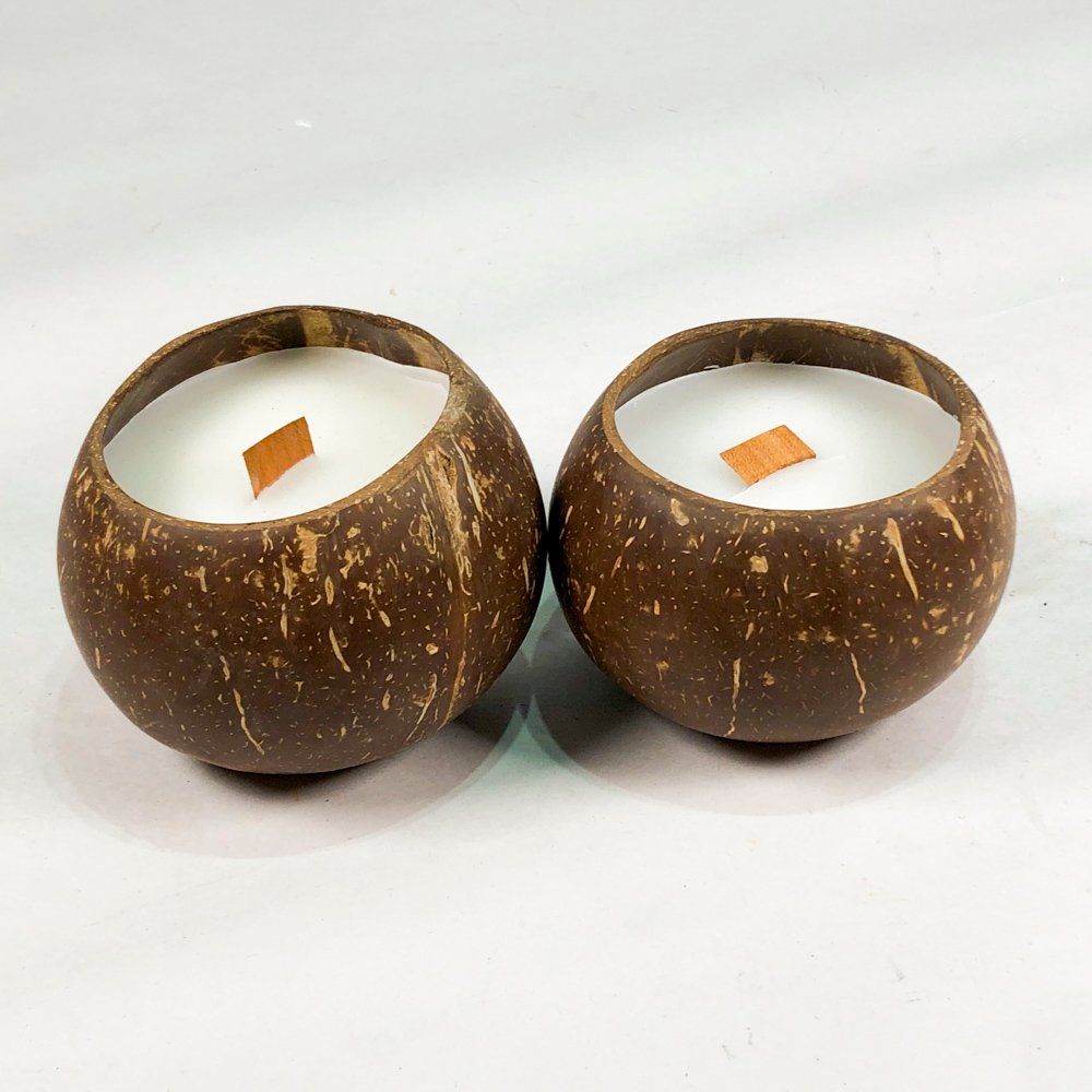 Lote siguiente: Dos velas en cerámica tipo calabaza con aroma a coco