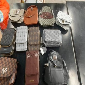 Lote siguiente: Lote de Carteras Variadas Sin Marca