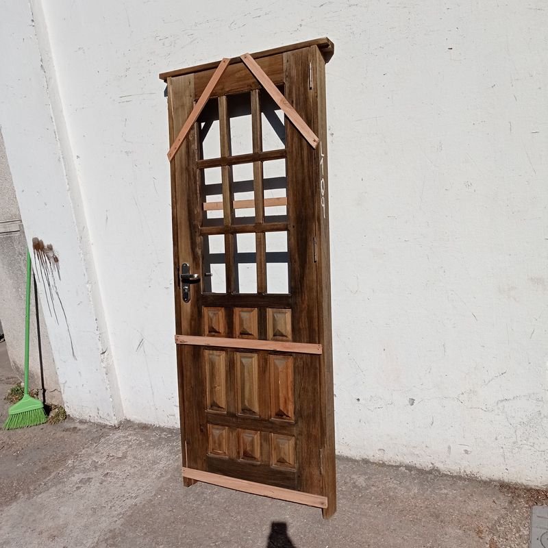 Puerta exterior en madera maciza con marco - imagen 3