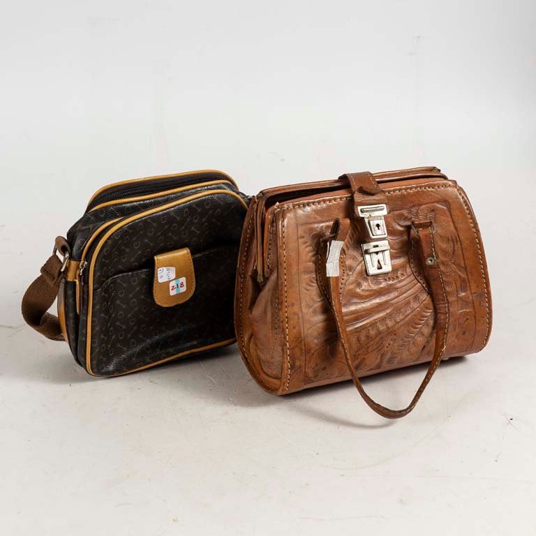 Lote anterior: Carteras de cuero con detalles