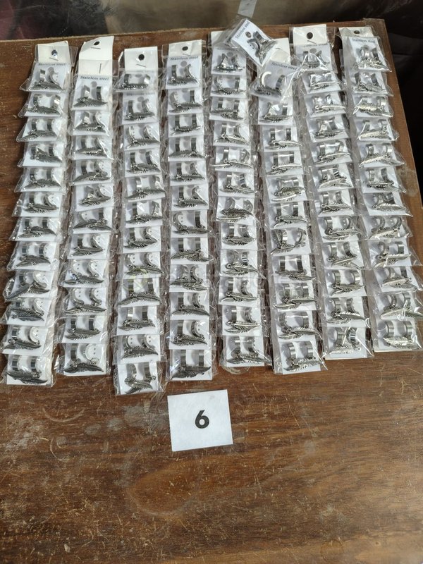 Lote de 100 Anillos de Acero Inoxidable con Diseño de Pluma
