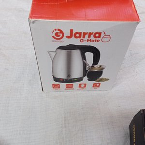 Tres piezas: jarra eléctrica + planchita + rizador - imagen 3