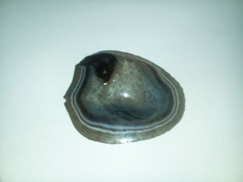 Lote siguiente: Cenicero de piedra decorativo con estilo y textura