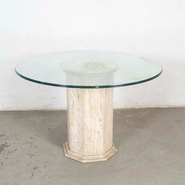 Mesa de comedor con tapa circular de vidrio biselado y pie central octogonal de mármol travertino - imagen 1