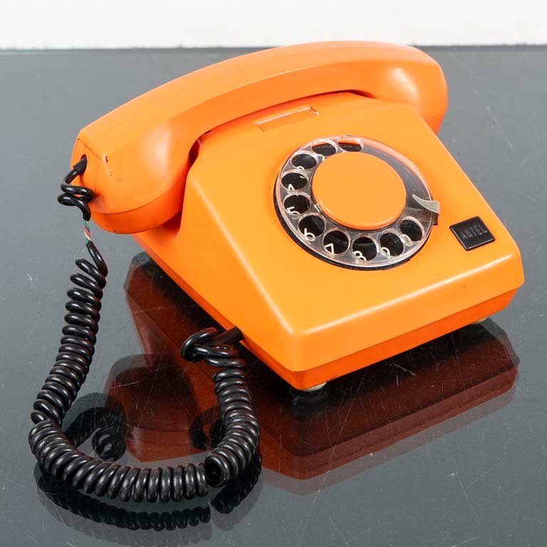Lote anterior: Teléfono de disco naranja vintage