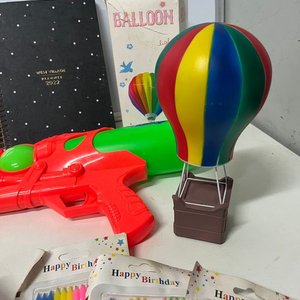 Lote Divertido: Bloques de Madera, Velas, Pistola de Agua y Más - imagen 4