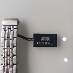 Reloj Orient Cuarzo Acero Inoxidable Esfera Blanca con Fecha - imagen 9