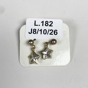 Lote siguiente: Par de caravanas de plata con piedra en forma de estrella