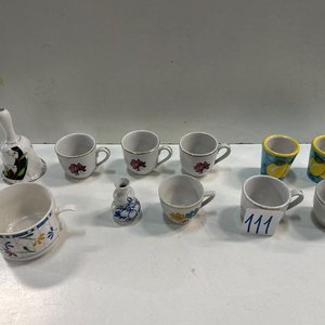 Lote siguiente: Conjunto de 8 Tacitas de Cerámica con Campana Decorativa