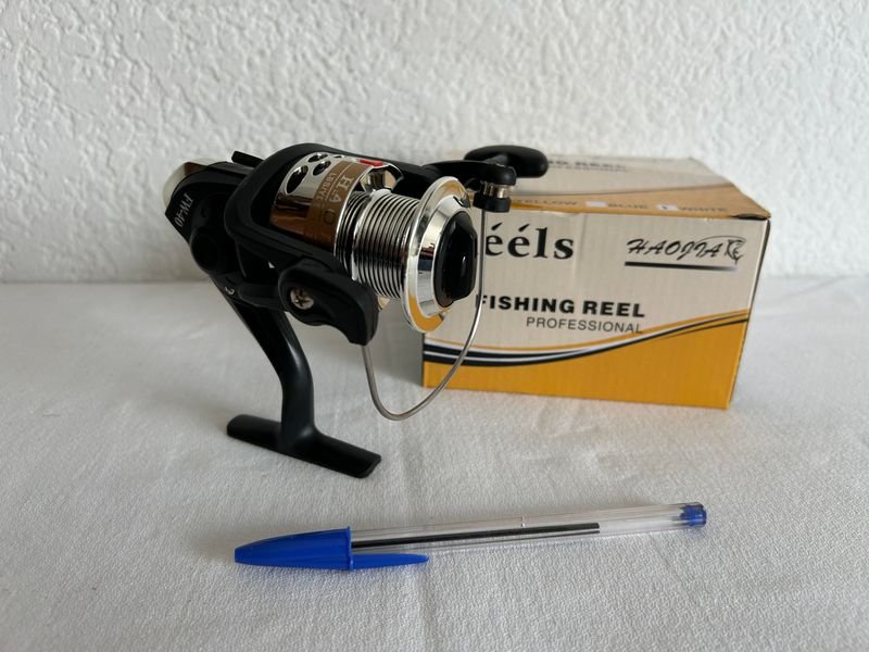 Reel de pesca nuevo en excelente condición - imagen 2