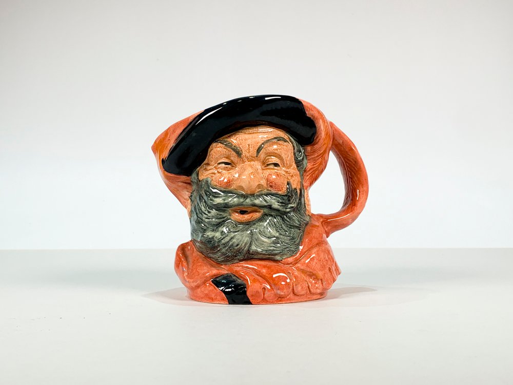 Lote siguiente: Jarra de porcelana Royal Doulton con motivo Sir John Falstaff
